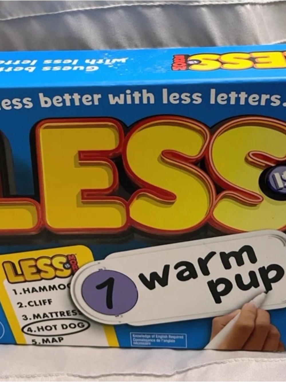 Spinmaster Games- Less is More Mystery Word Guessing Card Game Family/Party Game